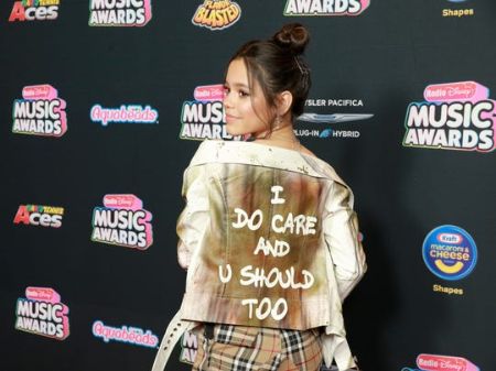 jenna on the red carpet wearing her i do care and you should too jacket 